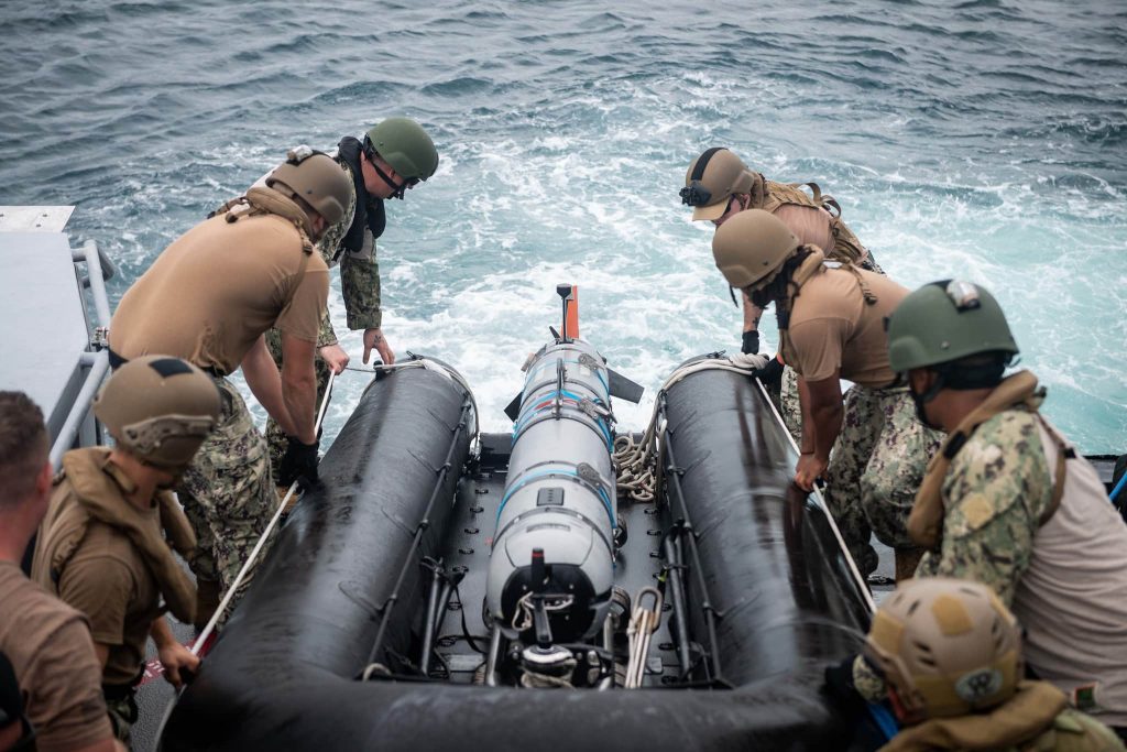 US Navy Personnel retrieve an Unmanned Underwater Vehicle