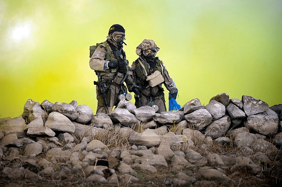 IDF soldiers in chemical suits.